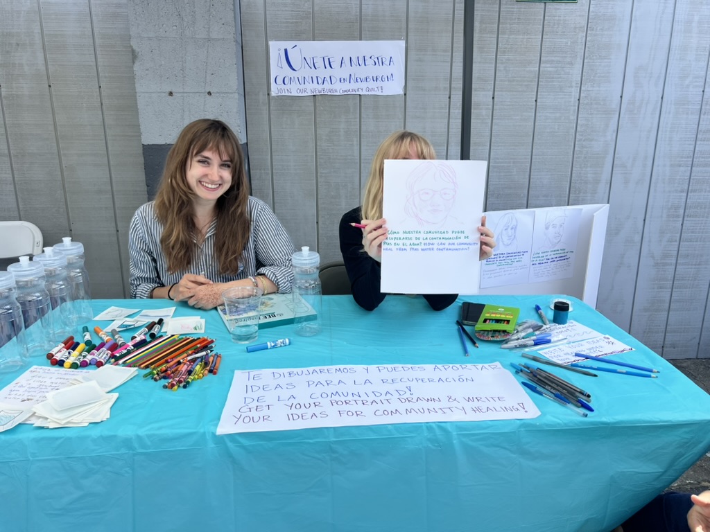 Bard College students at the portrait table with the prompt How can our community heal from PFAS water contamination